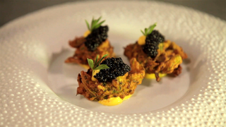 Zucchini fritters with caviar and saffron – yogurt & feta cheese